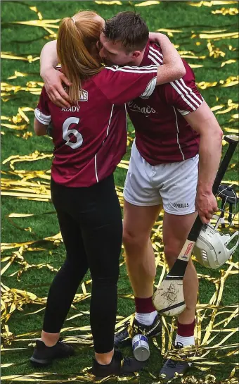  ??  ?? Joe Canning embraces Shannon Keady, daughter of the late Tony, after Galway’s victory.