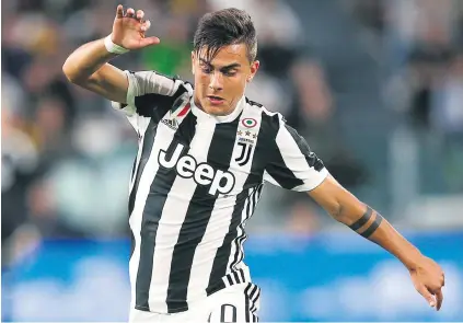  ?? Picture: Getty Images ?? FRIENDLY ENEMIES. There should be plenty of fireworks when Argentine national team-mates Paulo Dybala (above) of Juventus locks horns with Barcelona’s Lionel Messi in Turin tonight.