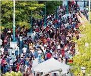  ?? 2014 AJC FILE ?? Crowds tend to start gathering in Centennial Olympic Park in Atlanta for Independen­ce Day fireworks and other holiday activities in late afernoon.