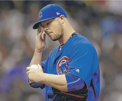  ??  ?? Jon Lester and the Cubs lost Wednesday but remain 3 games ahead of the Brewers, who fell to the Pirates. | CHRIS O’MEARA/ AP