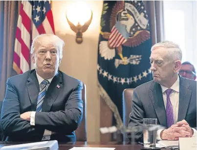  ?? Picture: Getty Images. ?? US Defence Secretary Jim Mattis, pictured right with President Trump, is unwilling to talk at the moment about negotiatio­ns to arrange a meeting with North Korean leader Kim Jong Un.