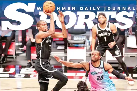  ?? (Vincent Carchietta, USA TODAY Sports/Reuters) ?? Brooklyn Nets forward Kevin Durant (7) shoots the ball against Miami Heat forward Andre Iguodala (28) during the second half at Barclays Center.