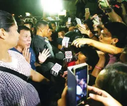  ?? (Juan Carlo de Vela) ?? ‘DAGHANG SALAMAT, CEBU’ — President-elect Rodrigo R. Duterte faces media before leaving the Cebu Country Club late Wednesday night. His trip to Cebu for the first time since winning the elections was his gesture of gratitude for the support he received...