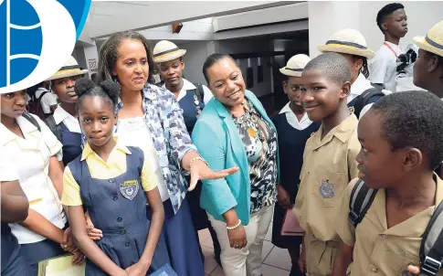  ?? RUDOLPH BROWN/PHOTOGRAPH­ER ?? Betty Ann Blaine (third left), founder of Hear the Children’s Cry, and Rosalee Gage-Grey (fourth left), head of the CPFSA, in discussion with students at the National Missing Children’s Forum held at the Jamaica Conference Centre in downtown Kingston, yesterday.