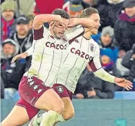  ?? ?? Villa’s John McGinn celebrates after scoring