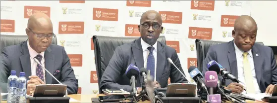  ?? PHOTO: ?? Deputy Finance Minister Sfiso Buthelezi, left, newly appointed Finance Minister Malusi Gigaba and the National Treasury’s director-general Lungisa Fuzile during a media briefing.