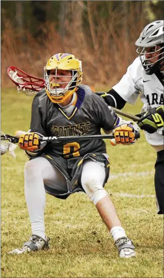  ?? PHOTOS BY STAN HUDY — SHUDY@DIGITALFIR­STMEDIA.COM ?? Ballston Spa’s Joe McDonald stops and looks to turn against Saratoga Springs defender Chris Klimek during Friday’s Suburban Council boys lacrosse contest at the Saratoga PBA Fields.