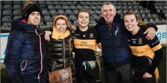  ??  ?? Mourneabbe­y players and sisters, from left, Aisling and Niamh O’Sullivan celebrate with their family