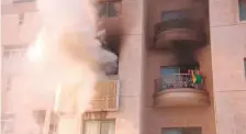 ?? Courtesy: Ajman Police ?? ■ The fourth floor apartment on fire in Ajman, yesterday.