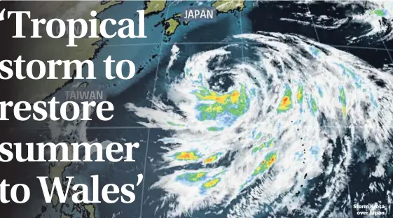  ??  ?? > Storm Krosa over Japan