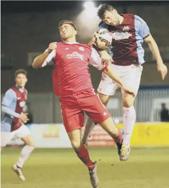  ??  ?? South Shields new boy Iulian Petrache wins a header in the midweek cup win over Penrith, but now starts a ban