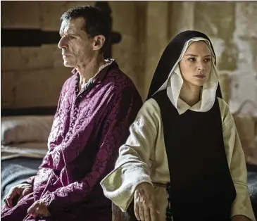  ?? IFC FILMS ?? Lambert Wilson (left) and Virginie Efira star in “Benedetta,” an adaptation of the book “Immodest Acts.”