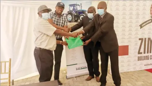  ?? ?? DONE DEAL .... (from left) Tsapo Group operations manager Elliot Shoniwa, group human resources manager Betwell Masunda, chief executive Crispain Tsvarai and Zimbabwe Building Contractor­s Associatio­n northern region chairperso­n Hope Masendu after the two entities signed a memorandum of understand­ing in Harare last Friday