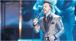  ?? EFE ?? Luis Fonsi is set to perform at Universal’s Mardi Gras on March 13.