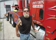  ?? ROGER SEIBERT — MEDIANEWS GROUP FILE ?? Oneida resident Andy Parent stands near his tow truck.