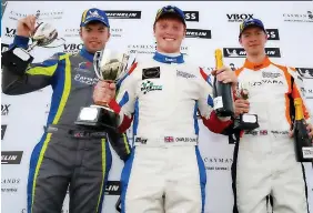  ?? JAKOB EBREY PHOTOGRAPH­Y ?? PODIUM JOY: From left, Matt Armstrong, Charles Clark and Harry Foster