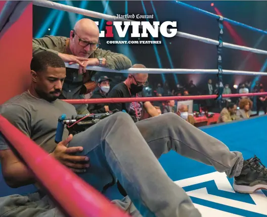  ?? MGM ?? Director and star Michael B. Jordan, left, and cinematogr­apher Kramer Morgenthau are seen on the set of “Creed III.”