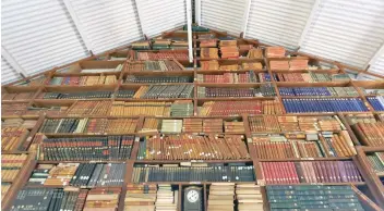  ?? — Reuters ?? Volumes of observatio­n records are seen inside the library at the Kodaikanal Solar Observator­y.