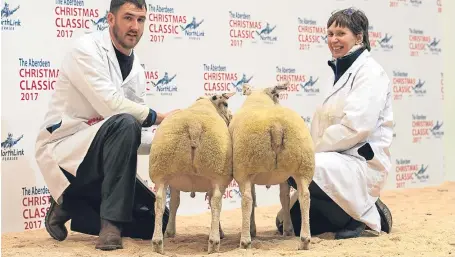  ?? Picture: Anne MacPherson. ?? The butchers sheep champions were a pair of 49.5kg three-quarter Beltex lambs from Helen and Steven Smith, Scobshaugh, Cortachy, Angus.