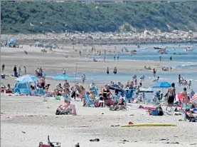  ?? STUART CAHILL / BOSTON HERALD ?? The scene around White Horse and Pricilla Beach, where a shark was spotted and the beaches closed temporaril­y on July 29, 2020, in Plymouth.