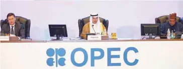  ??  ?? Kuwait Oil Minister Ali Al-Omair (centre) gives his opening speech during Opec 2nd Joint Ministeria­l Monitoring Committee meeting in Kuwait City, Kuwai yesterday as Novak (left) and Opec secretary general Mohammad Barkindo look on.