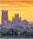  ??  ?? Sunset over Ely Cathedral: temperatur­es in East Anglia are set to hit 90F on Tuesday