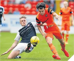  ??  ?? Raith’s Kevin McHattie challenges Scott Fraser.