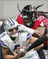  ?? THE ASSOCIATED PRESS FILE ?? This picture was worth a thousand nightmares for the Cowboys last week, after QB Dak Prescott was sacked eight times in a humiliatin­g loss to the Atlanta Falcons, including this time by Adrian Clayborn ... one of his six for the game.
