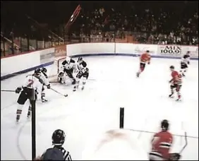  ??  ?? Action from the Truro Bearcats first game during the 1997-98 season against the Charlottet­own Abbies.