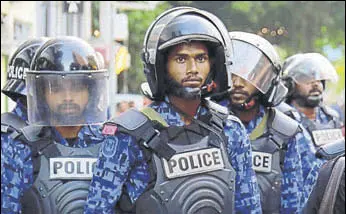  ?? AP FILE ?? Police stand guard during a protest in Male in February.