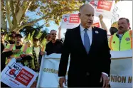  ?? AP PHOTO BY JANIE HAR ?? Gov. Jerry Brown joins a rally on behalf of a campaign against a repeal of the gas tax on Friday Nov. 2, in Palo Alto, Calif.