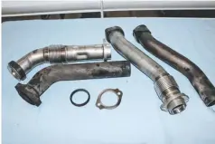  ??  ?? Another common area for failure in the 7.3 platforms is the exhaust uppipes that connect the manifolds to the inlet of the turbocharg­er. The factory pipes use a crush donut that has been prone to blowing out and leaking.
Riff Raff Diesel builds complete replacemen­t up-pipe kits that use a much stronger and more durable bellowed design that will seal better under the constant changes in temperatur­e.