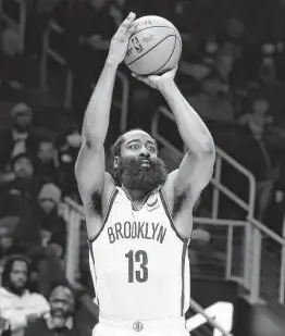  ?? Todd Kirkland / Getty Images ?? Brooklyn’s James Harden cleared health and safety protocols Thursday and is expected to play against the Los Angeles Lakers on Christmas Day.