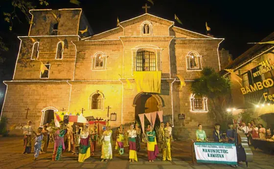  ?? –PHOTOS BY LESTER BABIERA ?? Manunugtog Kawayan, a band that uses bamboo-based musical instrument­s, welcomes guests on opening recital of the Internatio­nal Bamboo Organ Festival, now on its 44th edition.