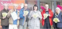  ??  ?? Challenge Stirling and Fair Trade Falkirk members outside the Stirling Sainsbury’s store: left to right, Eve Keepax, Jon Cape, Alasdair Tollemache, Sandra Burt, Andy Paterson, Terri Paterson