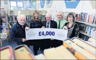  ??  ?? (Left to right) – Keith Smith, of Sapcote Library; Jo Dyke, Community and Membership Adviser of the Heart of England Co-operative Society; Clive Miles, President of the Society; Paul Lamb, Store Manager of The Co-operative at Sapcote; Lorraine Jackson, Chairwoman of Sapcote Community Library