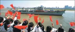  ?? ZHU WENBIAO / FOR CHINA DAILY ?? Elementary school students celebrate the opening of the CNS Theme Park in Nanchang, Jiangxi province, on Monday. The CNS China’s first-generation missile destroyer, was commission­ed in 1982. It was taken out of service in 2016 and will serve as a base...