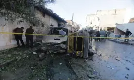  ?? Photograph: INA Photo Agency/Rex/Shuttersto­ck ?? The scene of the bombing in Azaz on Sunday.