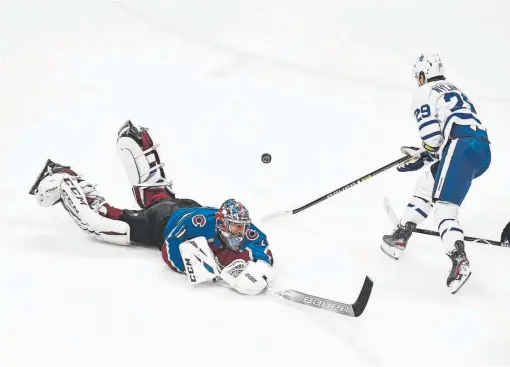  ?? Andy Cross, The Denver Post ?? Philipp Grubauer skates out of his crease to confront charging Toronto Maple Leafs right wing William Nylander, who couldn't get the puck past the Avalanche goaltender during the second period Tuesday night at the Pepsi Center.