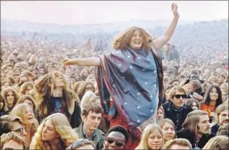  ?? Associated Press ?? A SEA of fans at the Altamont Speedway Free Festival in December 1969 in Livermore, Calif., where members of Hells Angels oversaw security during the Rolling Stones’ set. Four people died.