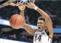  ?? Gerry Broome / Associated Press ?? Robert Williams had a chance to go pro after his freshman year, but he came back and helped lead Texas A&amp;M to the Sweet 16.