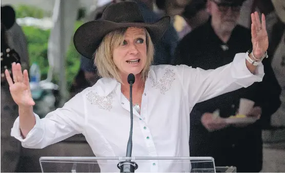  ?? JEFF MCINTOSH /THE CANADIAN PRESS ?? Premier Rachel Notley speaks to the crowd at the premier's annual Stampede breakfast on Monday. “We have laid out a responsibl­e and careful plan to (balance the) budget at around 2023. And we know that's where we have to get,” said Notley.