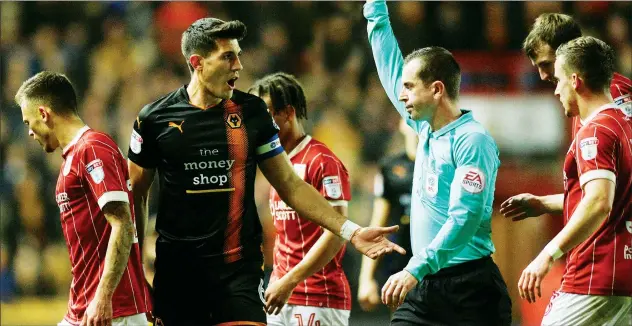  ?? PICTURE: Action Images ?? CAPTAIN CALAMITY: Wolves skipper Danny Batth is shown the red card by referee Peter Bankes for a foul after just 14 minutes