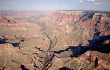  ??  ?? The Colorado River runs through Grand Canyon National Park in this aerial photograph.