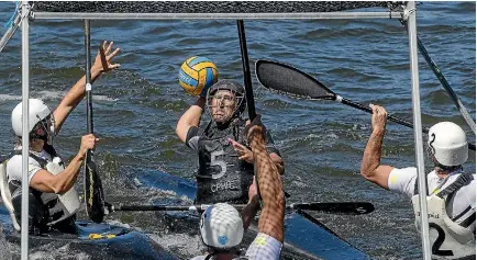  ?? PHOTOS: WARWICK SMITH/STUFF ?? AJ Bowden, of the Hurricanes, lines up to shoot a goal in the men’s A1 final against Palmerston North Canoe Club’s Expose.