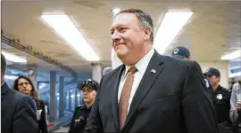  ?? ERIN SCHAFF / THE NEW YORK TIMES ?? CIA Director Mike Pompeo’s visit with North Korean leader Kim Jong Un suggests the summit between Kim and President Donald Trump is on track.