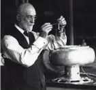  ?? SENTINEL ARCHIVES MILWAUKEE JOURNAL ?? In 1890, a butterfat tester developed by UW-Madison professor Stephen Babcock gave farmers, creameries and cheesemake­rs a simple and fast way to determine the quality of milk. Babcock is shown with his electric butterfat tester around 1926.