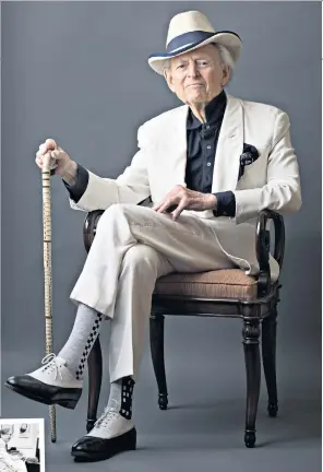  ??  ?? A patented uniform: Tom Wolfe photograph­ed last year; inset, pictured in New York in 1965