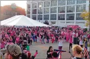  ??  ?? Thousands of walkers gather at last year’s Making Strides Against Breast Cancer walk outside Fifth Third Field in downtown Dayton.
