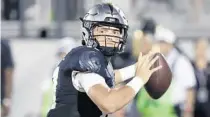  ?? JOHN RAOUX/AP ?? UCF quarterbac­k Dillon Gabriel and the Knights will push to kick off the 2020 season with a win at Georgia Tech on Saturday.